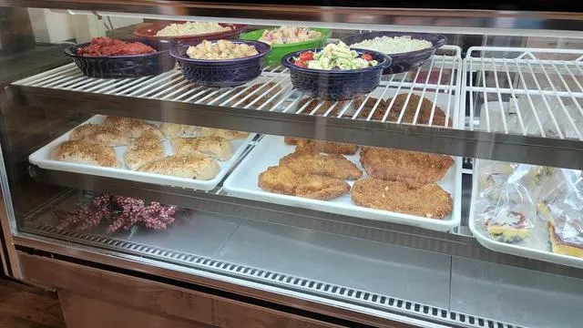Poppies Delight Pizza And Sandwiches